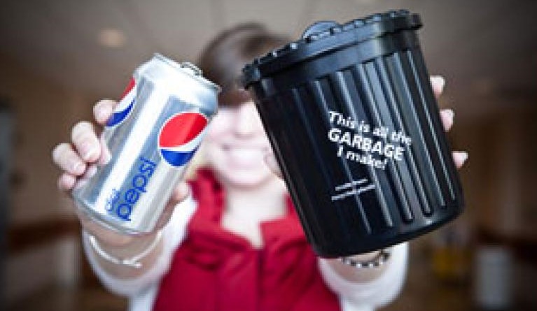 Picture of person holding up a mini waste bin