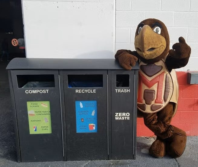 Testudo with compost, recycle, and landfill bins in SECU stadium