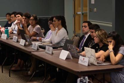 SGA members sitting a long table