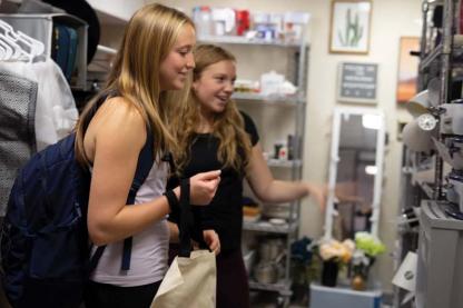 Students browsing Terp to Terp Reuse Store