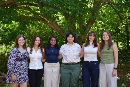 Six office of sustainability interns pose for a photo