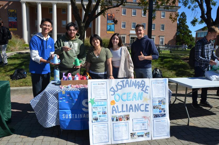 Image of 5 members of the student organization Sustainable Ocean Alliance posing for a picture