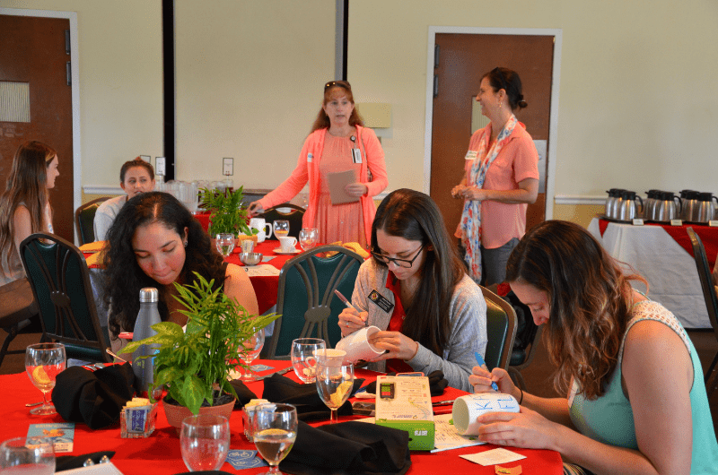 Staff Decorate Mugs at Green Office Event