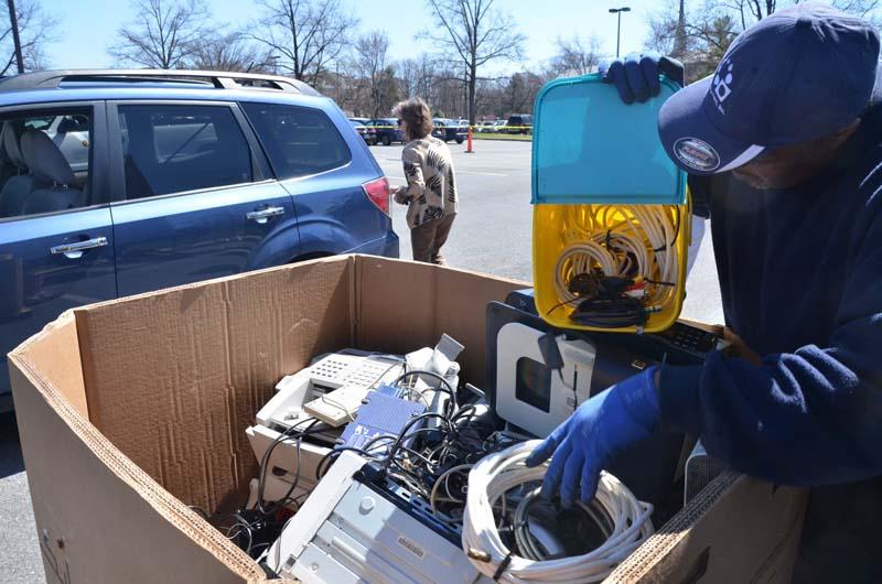 Collecting e-waste in a container to be recycled