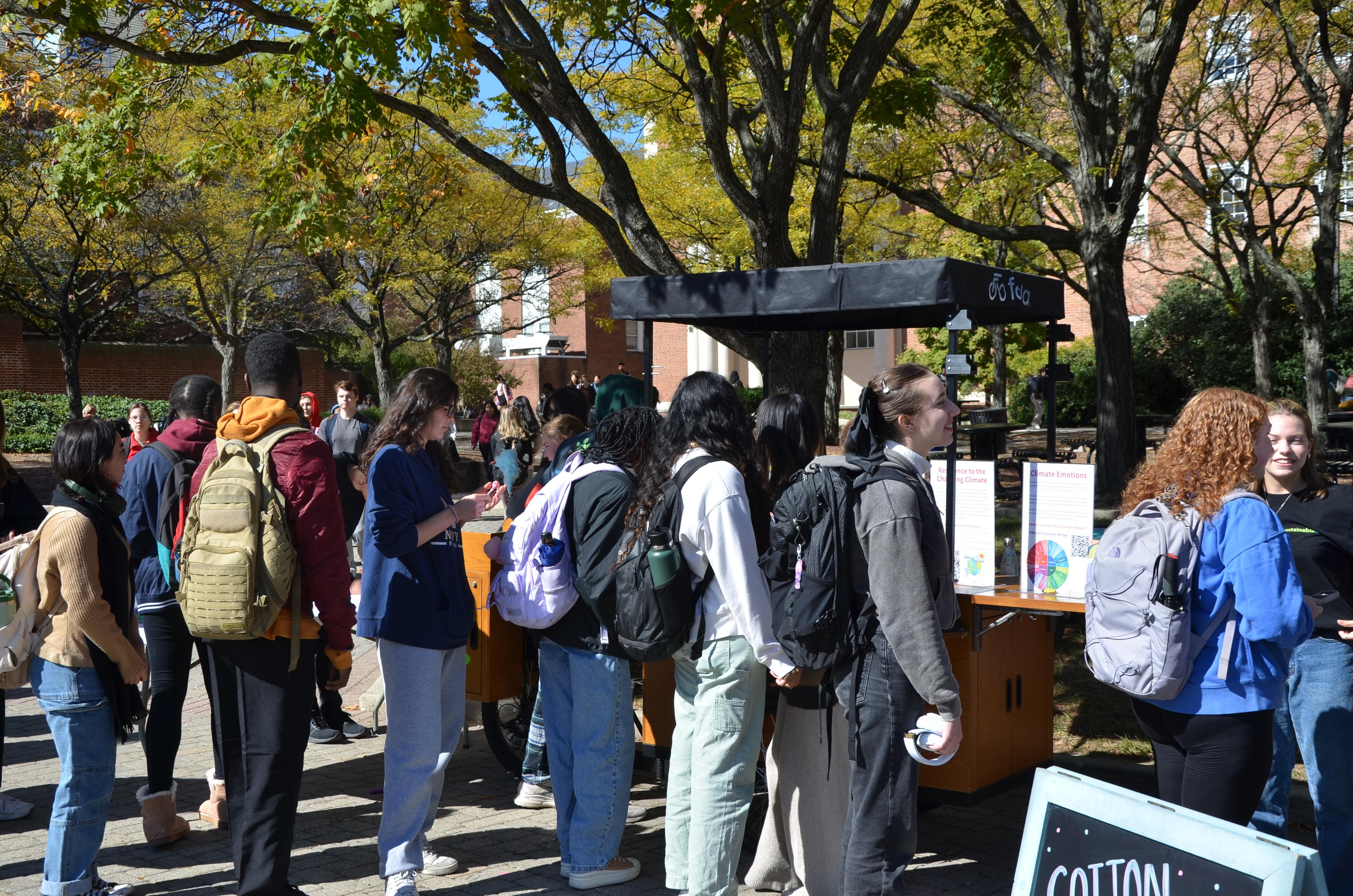 Image of students waiting in line to get cotton candy