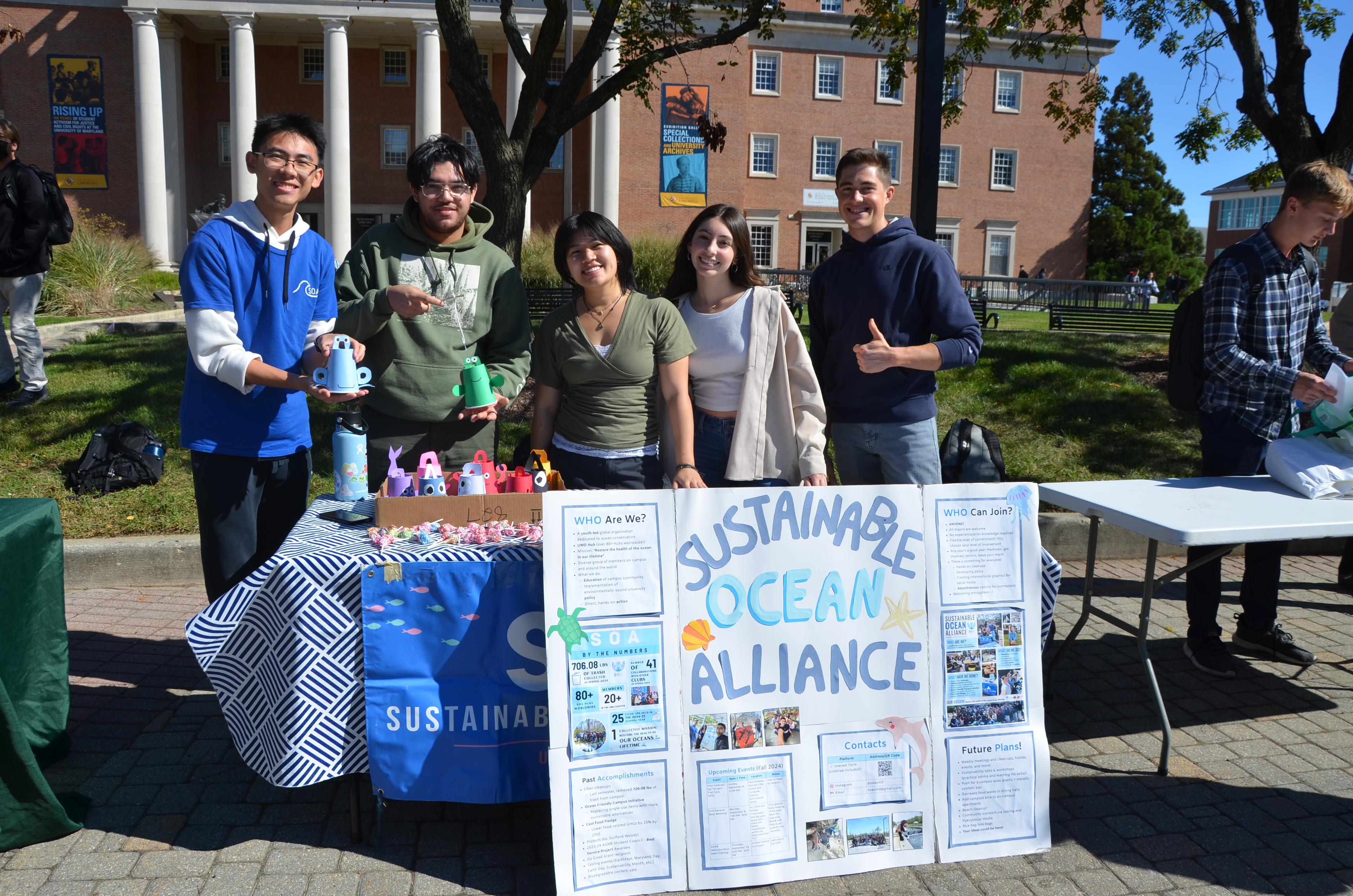 Image of 5 members of the student organization Sustainable Ocean Alliance posing for a picture