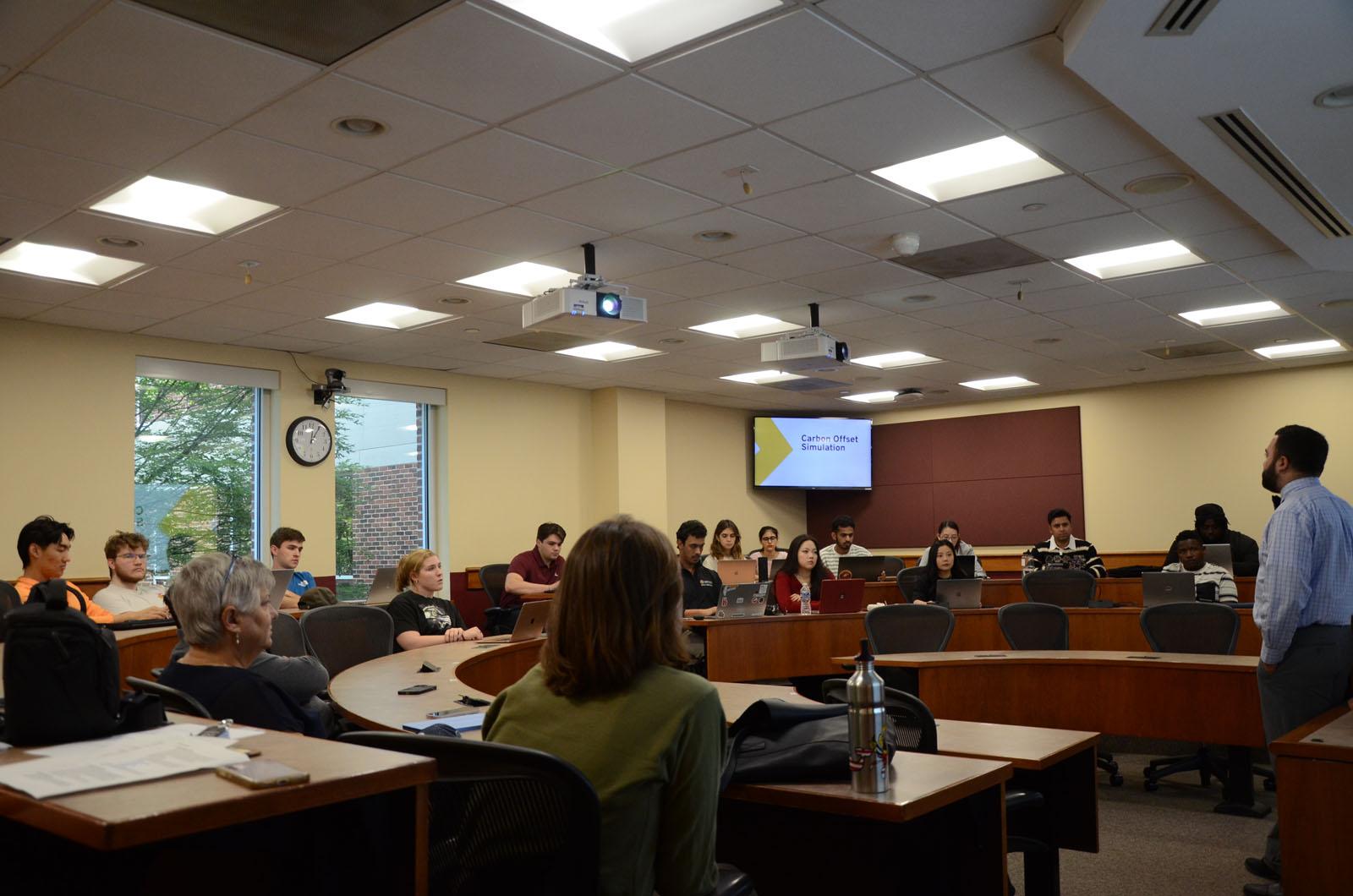 Nima Farschi lecturing a class